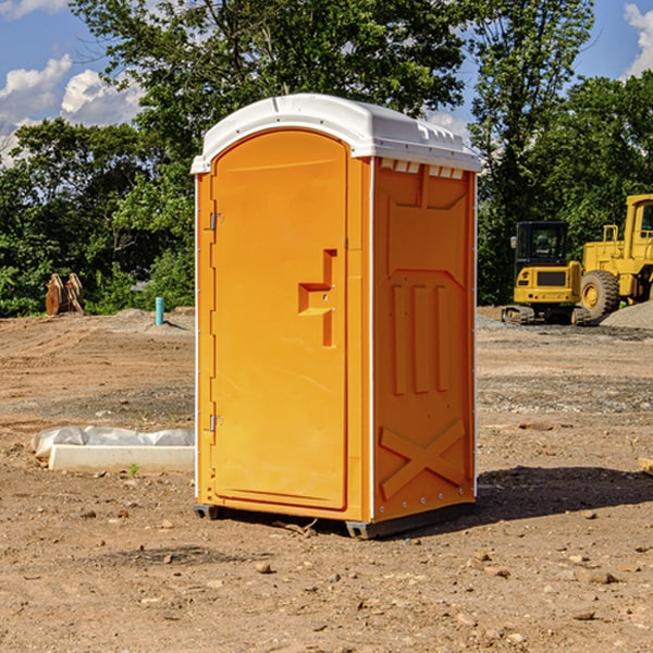 how often are the porta potties cleaned and serviced during a rental period in Berne